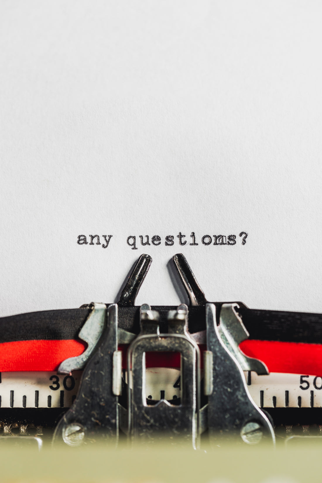 text-on-typewriter-asks-any-questions